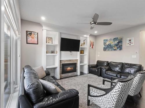 2504 22 Avenue Nw, Edmonton, AB - Indoor Photo Showing Living Room With Fireplace