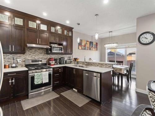 2504 22 Avenue Nw, Edmonton, AB - Indoor Photo Showing Kitchen With Double Sink With Upgraded Kitchen