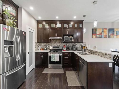 2504 22 Avenue Nw, Edmonton, AB - Indoor Photo Showing Kitchen With Double Sink With Upgraded Kitchen