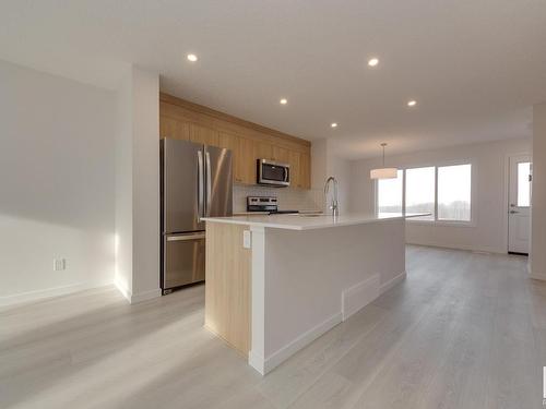 2460 Trumpeter Way, Edmonton, AB - Indoor Photo Showing Kitchen