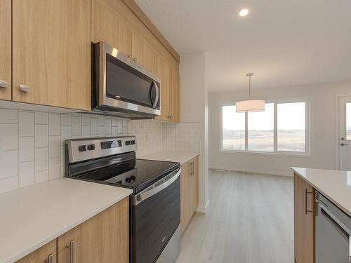 2460 Trumpeter Way, Edmonton, AB - Indoor Photo Showing Kitchen