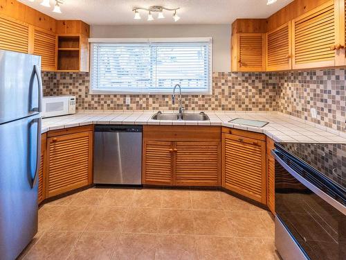 158 22106 South Cooking Lake Road, Rural Strathcona County, AB - Indoor Photo Showing Kitchen With Stainless Steel Kitchen With Double Sink