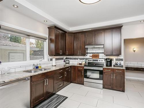 14719 59 Avenue, Edmonton, AB - Indoor Photo Showing Kitchen With Double Sink