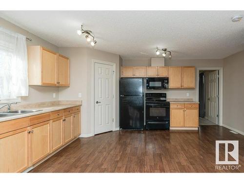 21 2336 Aspen Trail, Sherwood Park, AB - Indoor Photo Showing Kitchen With Double Sink