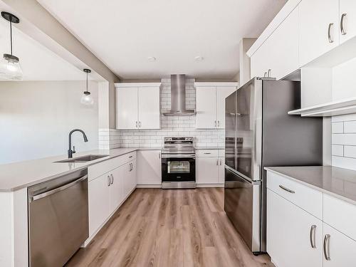 4602 72 Avenue, Beaumont, AB - Indoor Photo Showing Kitchen With Upgraded Kitchen