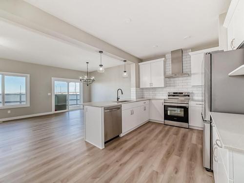 4602 72 Avenue, Beaumont, AB - Indoor Photo Showing Kitchen With Upgraded Kitchen