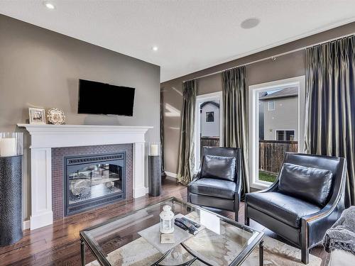 11506 16A Avenue, Edmonton, AB - Indoor Photo Showing Living Room With Fireplace