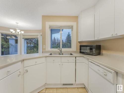 11307 10 Avenue, Edmonton, AB - Indoor Photo Showing Kitchen With Double Sink