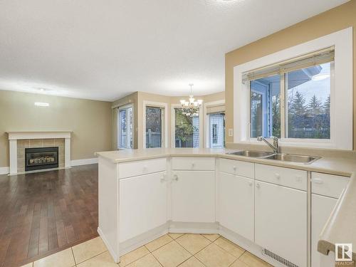 11307 10 Avenue, Edmonton, AB - Indoor Photo Showing Other Room With Fireplace