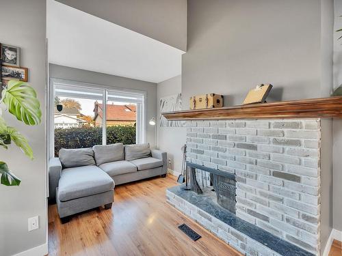 11127 157A Avenue, Edmonton, AB - Indoor Photo Showing Living Room With Fireplace