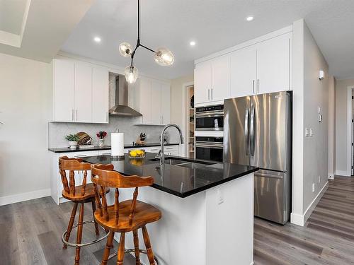 398 Bluff Cove, Leduc, AB - Indoor Photo Showing Kitchen With Upgraded Kitchen