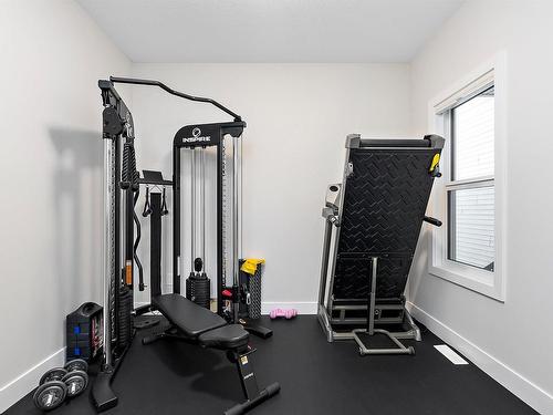 398 Bluff Cove, Leduc, AB - Indoor Photo Showing Gym Room