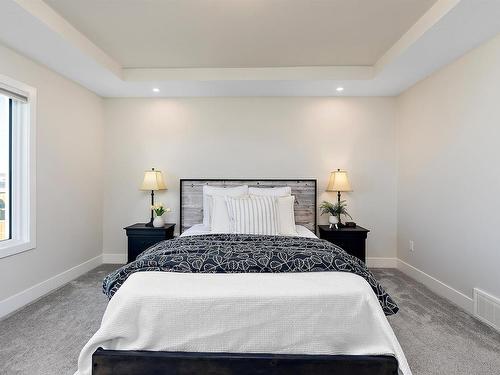 398 Bluff Cove, Leduc, AB - Indoor Photo Showing Bedroom