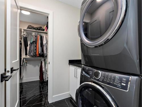 398 Bluff Cove, Leduc, AB - Indoor Photo Showing Laundry Room