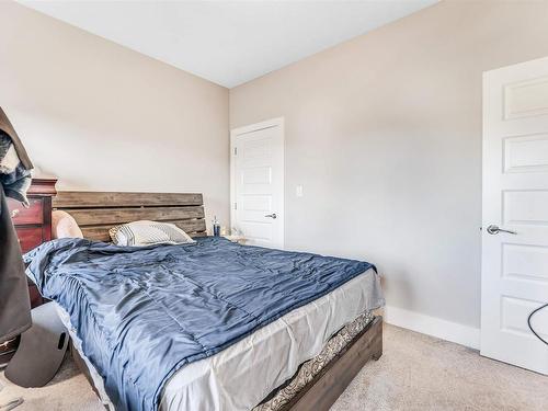 4 Lakeshore Cove, Beaumont, AB - Indoor Photo Showing Bedroom