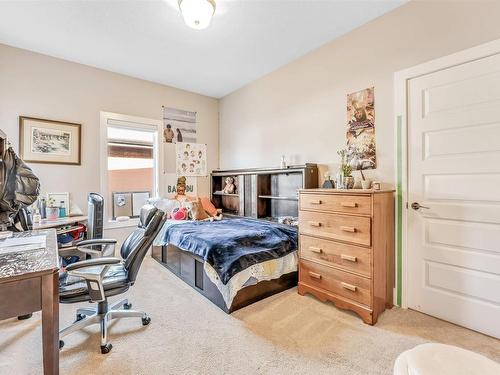 4 Lakeshore Cove, Beaumont, AB - Indoor Photo Showing Bedroom