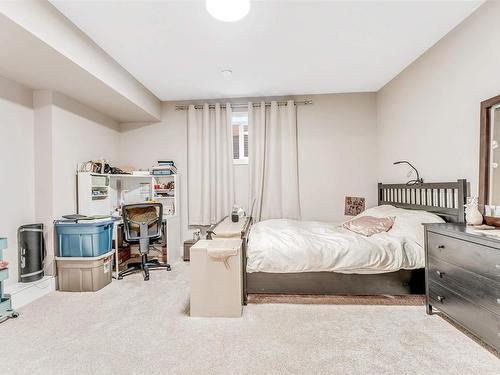 4 Lakeshore Cove, Beaumont, AB - Indoor Photo Showing Bedroom