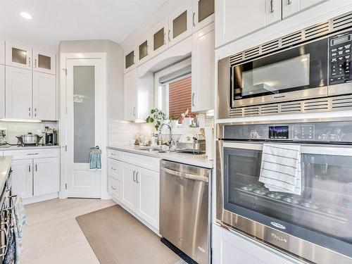 4 Lakeshore Cove, Beaumont, AB - Indoor Photo Showing Kitchen With Stainless Steel Kitchen With Upgraded Kitchen