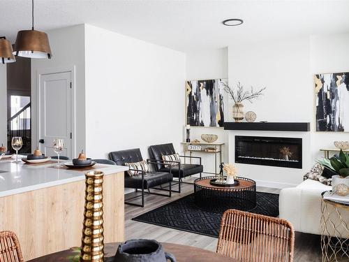 161 Starling, Fort Saskatchewan, AB - Indoor Photo Showing Living Room With Fireplace