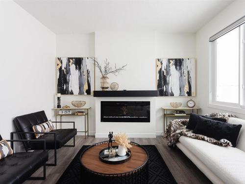 161 Starling, Fort Saskatchewan, AB - Indoor Photo Showing Living Room With Fireplace