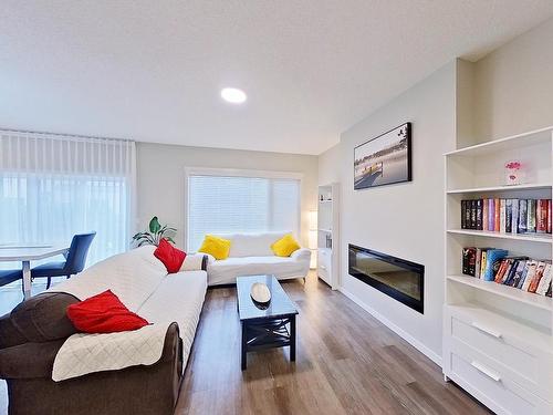 19616 26 Avenue, Edmonton, AB - Indoor Photo Showing Living Room With Fireplace