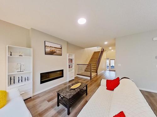 19616 26 Avenue, Edmonton, AB - Indoor Photo Showing Living Room With Fireplace