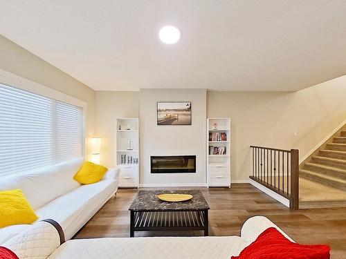 19616 26 Avenue, Edmonton, AB - Indoor Photo Showing Living Room With Fireplace