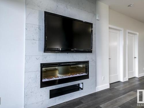 532 200 Bellerose Drive, St. Albert, AB - Indoor Photo Showing Living Room With Fireplace