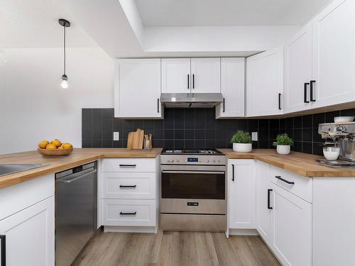 13126 / 13128 65 Street, Edmonton, AB - Indoor Photo Showing Kitchen