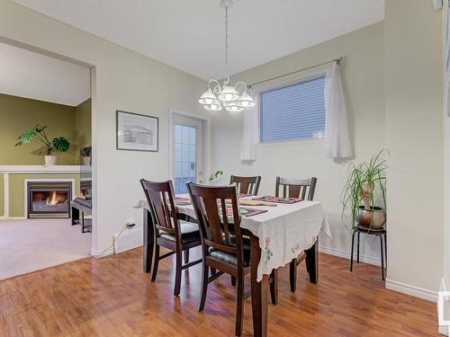 9011 166 Avenue, Edmonton, AB - Indoor Photo Showing Dining Room With Fireplace