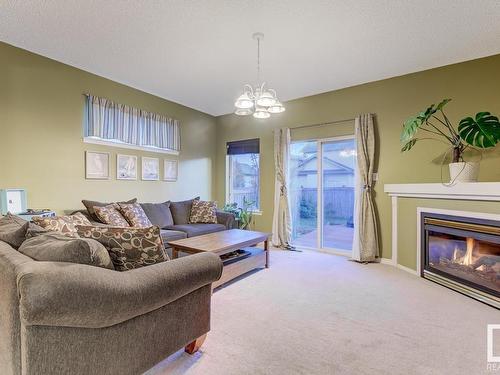 9011 166 Avenue, Edmonton, AB - Indoor Photo Showing Living Room With Fireplace