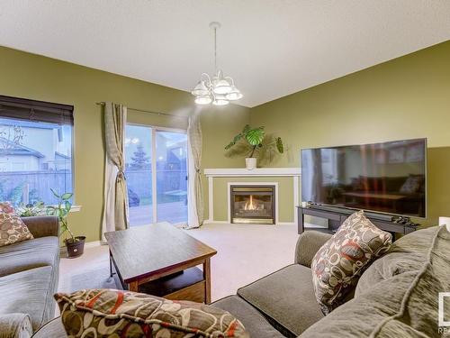 9011 166 Avenue, Edmonton, AB - Indoor Photo Showing Living Room With Fireplace