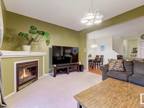 9011 166 Avenue, Edmonton, AB - Indoor Photo Showing Living Room With Fireplace