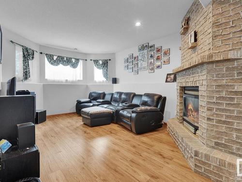 4536 57 Avenue, Lamont, AB - Indoor Photo Showing Living Room With Fireplace