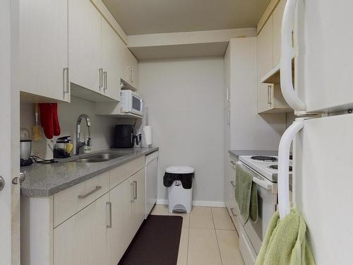 1134 Knottwood E, Edmonton, AB - Indoor Photo Showing Kitchen With Double Sink