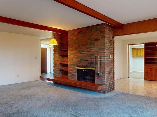 115 Spatinow Drive, Wetaskiwin, AB - Indoor With Fireplace