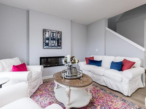 4027 208 Street, Edmonton, AB - Indoor Photo Showing Living Room With Fireplace