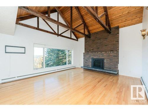 220 Grandisle Point, Edmonton, AB - Indoor Photo Showing Living Room With Fireplace