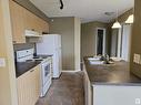 406 636 Mcallister Loop, Edmonton, AB  - Indoor Photo Showing Kitchen With Double Sink 