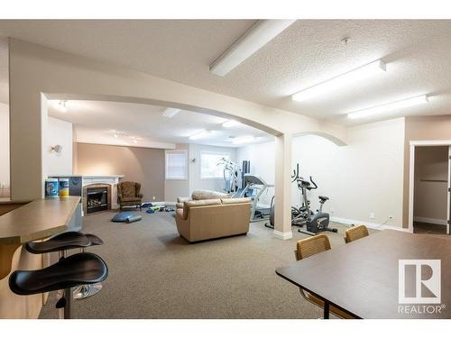 404 10178 117 Street, Edmonton, AB - Indoor Photo Showing Gym Room