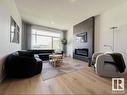 320 32 Street, Edmonton, AB  - Indoor Photo Showing Living Room With Fireplace 