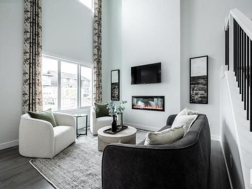 20956 22 Avenue, Edmonton, AB - Indoor Photo Showing Living Room With Fireplace