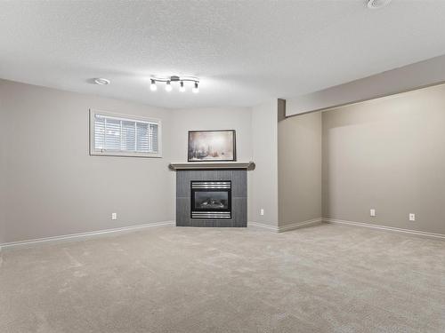 6011 Stinson Road, Edmonton, AB - Indoor Photo Showing Living Room With Fireplace