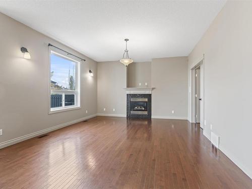 6011 Stinson Road, Edmonton, AB - Indoor Photo Showing Living Room With Fireplace