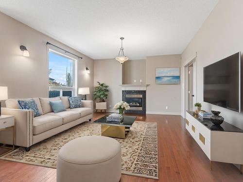 6011 Stinson Road, Edmonton, AB - Indoor Photo Showing Living Room With Fireplace