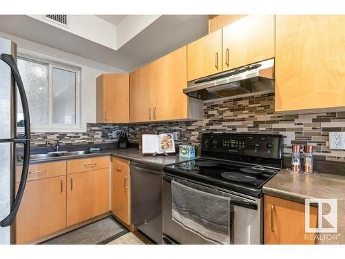 405 10606 102 Avenue, Edmonton, AB - Indoor Photo Showing Kitchen With Double Sink