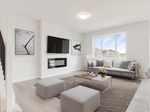 17431 2 Street, Edmonton, AB - Indoor Photo Showing Living Room With Fireplace