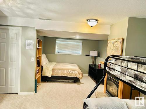 5024 39 Street, Sylvan Lake, AB - Indoor Photo Showing Bedroom