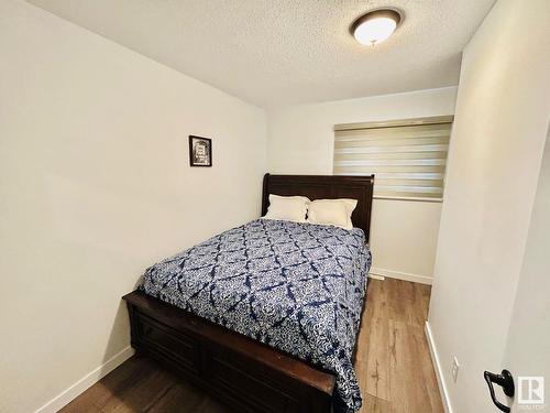 3602 50Th Avenue, Sylvan Lake, AB - Indoor Photo Showing Bedroom