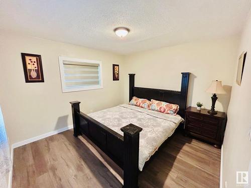 3602 50Th Avenue, Sylvan Lake, AB - Indoor Photo Showing Bedroom